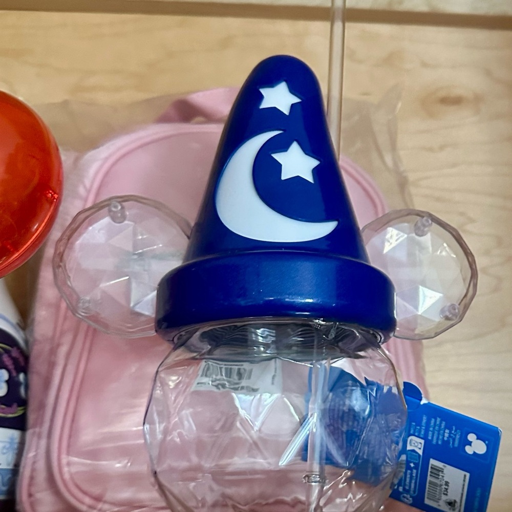 Blue Sorcerer Mickey Ears tumbler sipper lights up on the hat